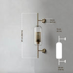 Elegant glass lantern wall sconce with a modern metal frame, perfect for ambient lighting in living rooms and bedrooms.