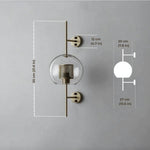 Elegant glass lantern wall sconce with a modern metal frame, perfect for ambient lighting in living rooms and bedrooms.