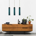 Elegant linear glass pendant light with sleek modern design, ideal for dining rooms, kitchens, and contemporary interiors.