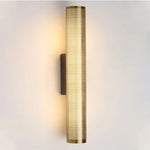 Luxury wall sconce with a sleek, modern design and warm ambient lighting, perfect for elegant bedrooms, living rooms, and hallways.