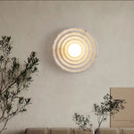 Koros Wall Sconce - Sculptural luxury wall lighting with ripple design, warm ambient glow, and premium craftsmanship for modern and elegant interiors.
