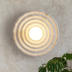 Koros Wall Sconce - Sculptural luxury wall lighting with ripple design, warm ambient glow, and premium craftsmanship for modern and elegant interiors.