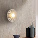 Koros Wall Sconce - Sculptural luxury wall lighting with ripple design, warm ambient glow, and premium craftsmanship for modern and elegant interiors.