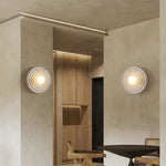 Koros Wall Sconce - Sculptural luxury wall lighting with ripple design, warm ambient glow, and premium craftsmanship for modern and elegant interiors.
