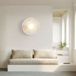 Koros Wall Sconce - Sculptural luxury wall lighting with ripple design, warm ambient glow, and premium craftsmanship for modern and elegant interiors.