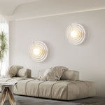 Koros Wall Sconce - Sculptural luxury wall lighting with ripple design, warm ambient glow, and premium craftsmanship for modern and elegant interiors.