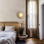 Koros Wall Sconce - Sculptural luxury wall lighting with ripple design, warm ambient glow, and premium craftsmanship for modern and elegant interiors.